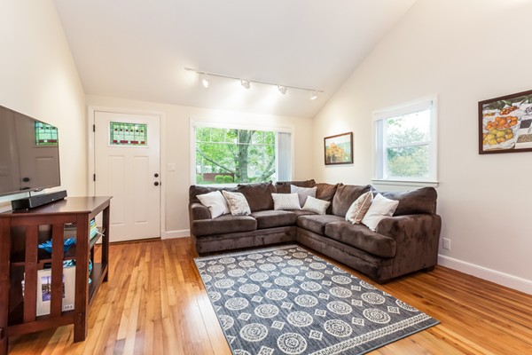 18 Mountain Road Waltham, MA 02451 - Photo 5 of 22 a living room with furniture and a flat screen tv