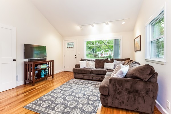 18 Mountain Road Waltham, MA 02451 - Photo 10 of 22 a living room with furniture and a flat screen tv