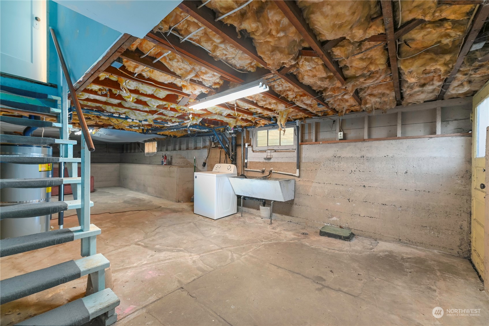1419 Rucker Avenue Everett, WA 98201 - Photo 24 of 39 a view of a room with wooden walls