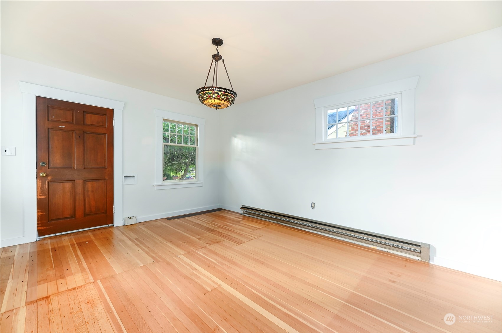 1419 Rucker Avenue Everett, WA 98201 - Photo 5 of 39 a view of an empty room with a window