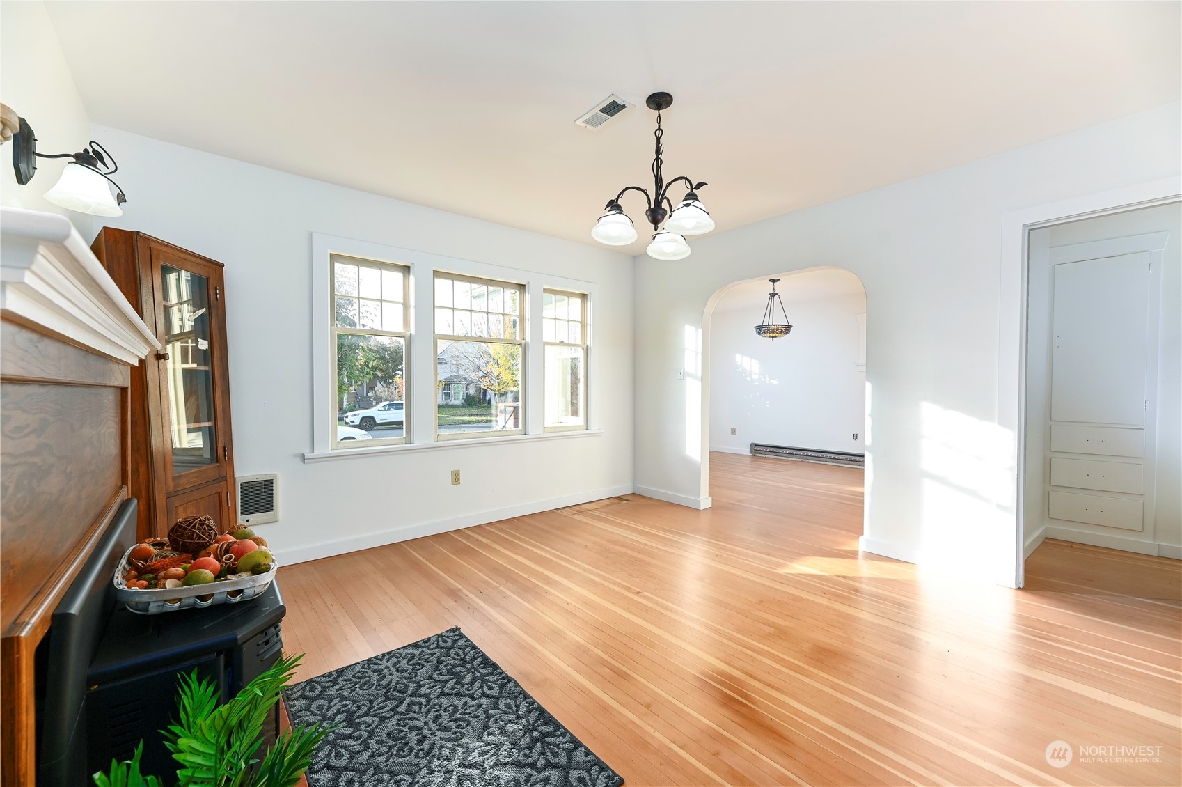 1419 Rucker Avenue Everett, WA 98201 - Photo 9 of 39 a view of an empty room and a kitchen