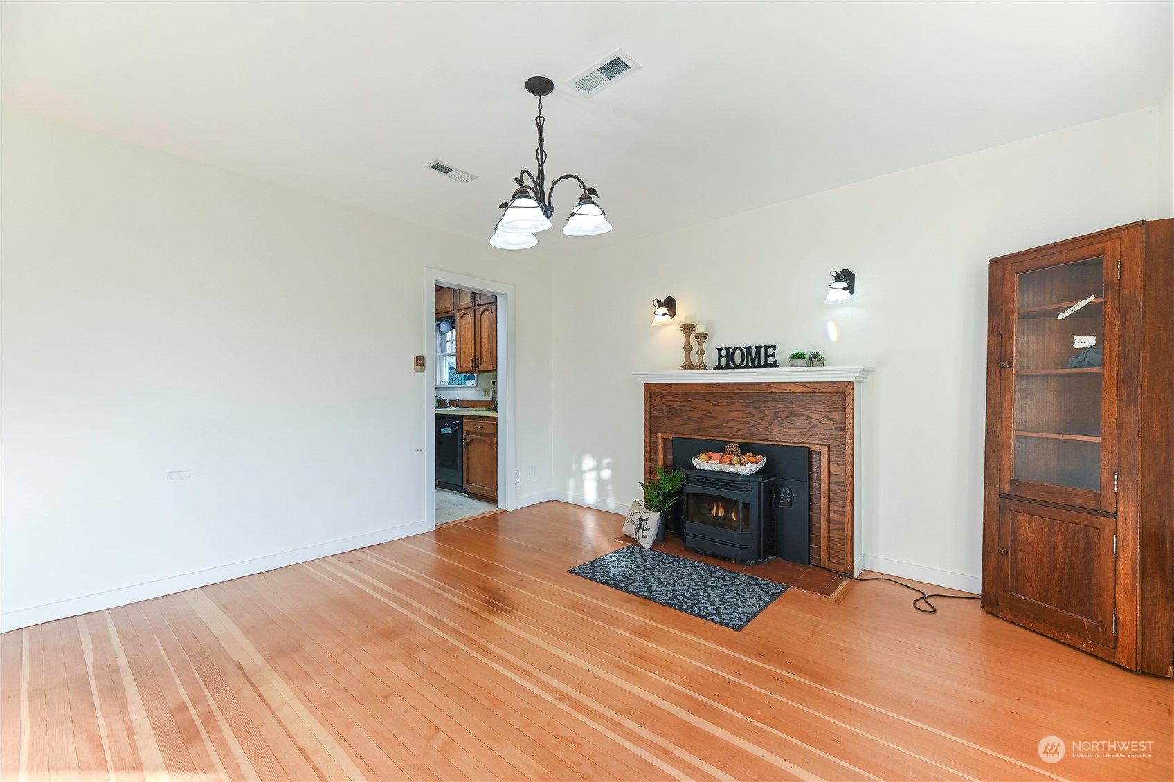 1419 Rucker Avenue Everett, WA 98201 - Photo 10 of 39 a bedroom with a bed and a fireplace