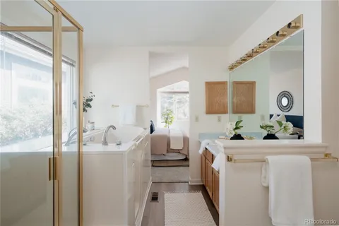 a kitchen with sink a refrigerator and washer