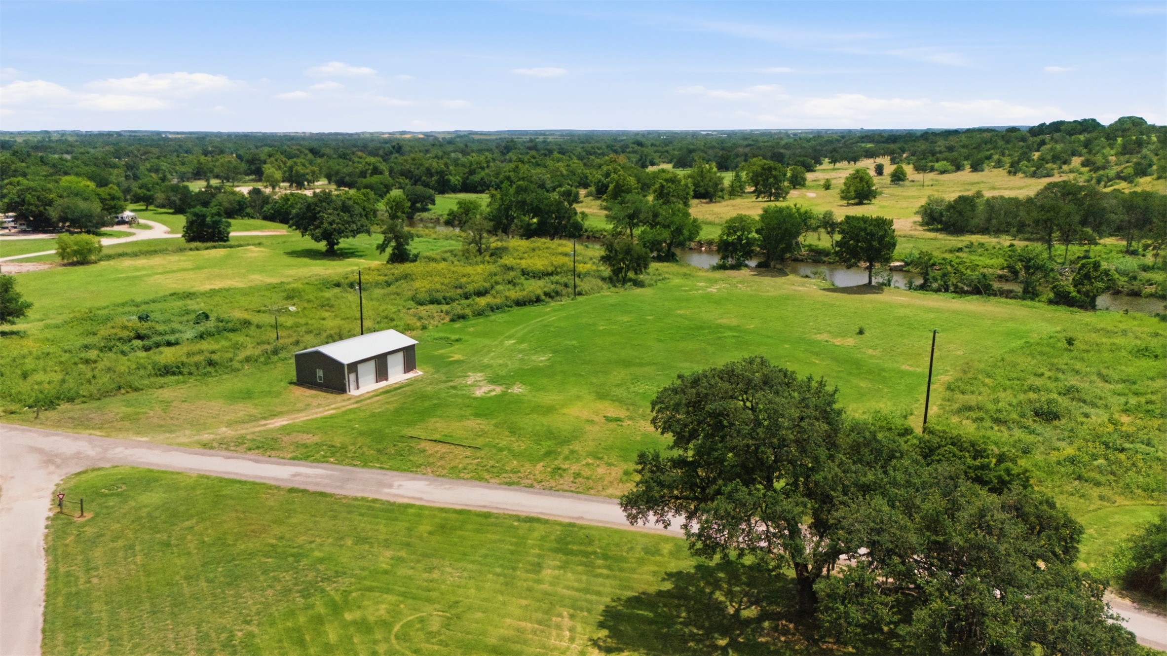 2043 Fm 971 Georgetown, TX 78626 - Photo 3 of 12 3.17 acres offering possibilities for fishing, kayaking or just chilling!