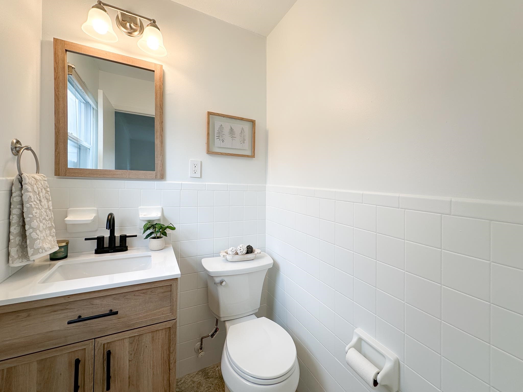 7472 Lilly Square Dayton, VA 22821 - Photo 20 of 30 a bathroom with a sink a toilet and mirror