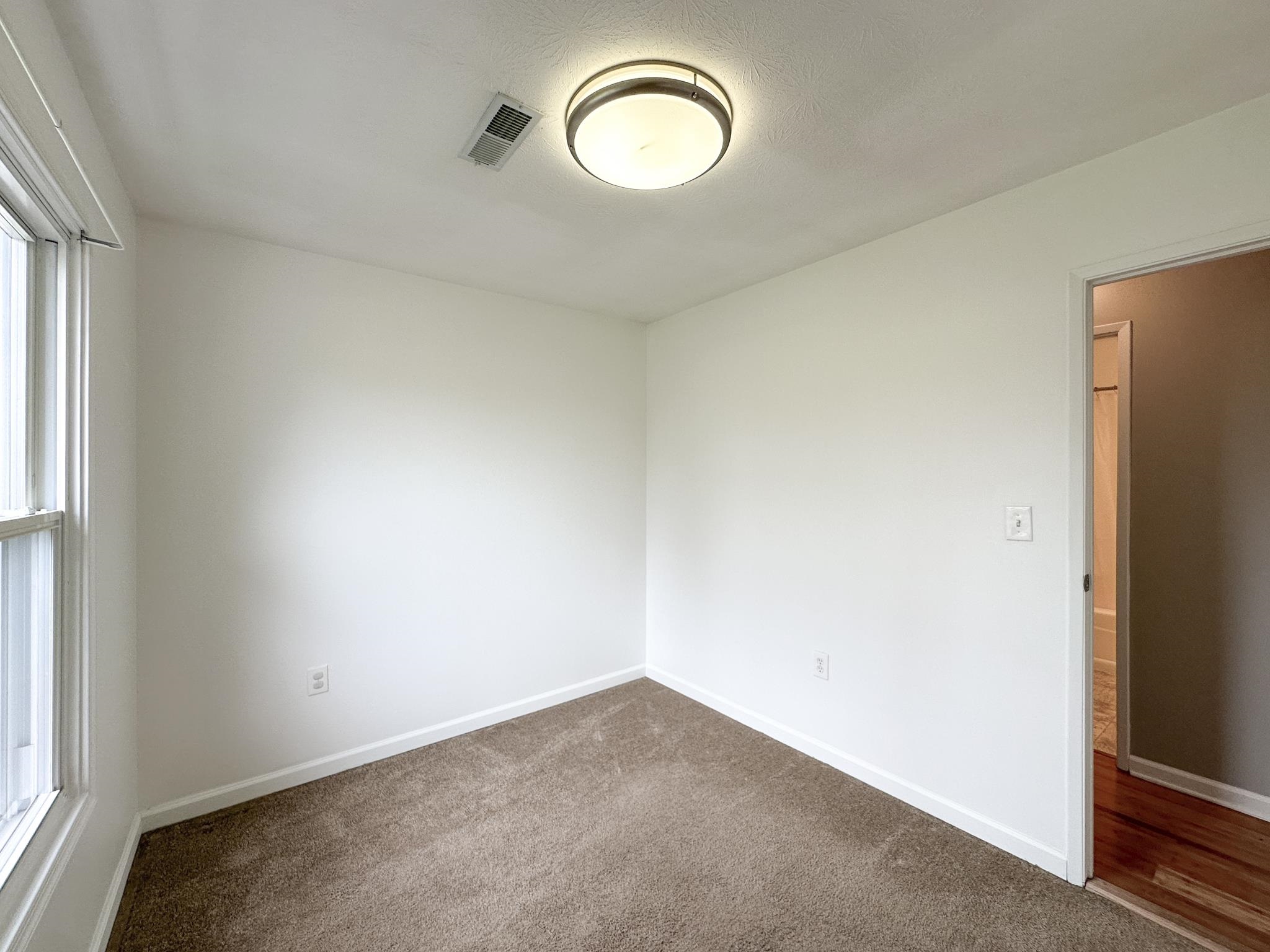 7472 Lilly Square Dayton, VA 22821 - Photo 22 of 30 an empty room with a window