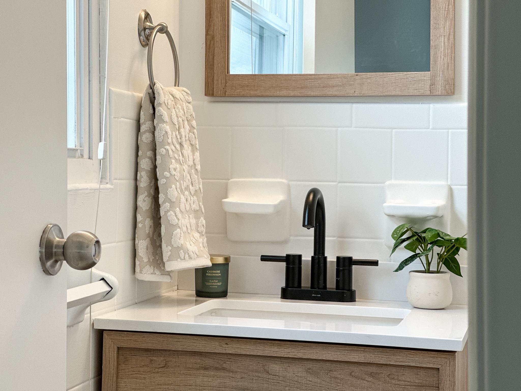 7472 Lilly Square Dayton, VA 22821 - Photo 24 of 30 a closeup of a sink with a potted plant