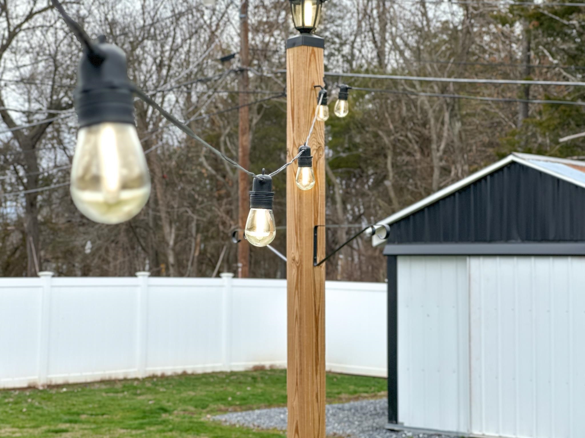 7472 Lilly Square Dayton, VA 22821 - Photo 29 of 30 a view of a house with a wooden fence and backyard