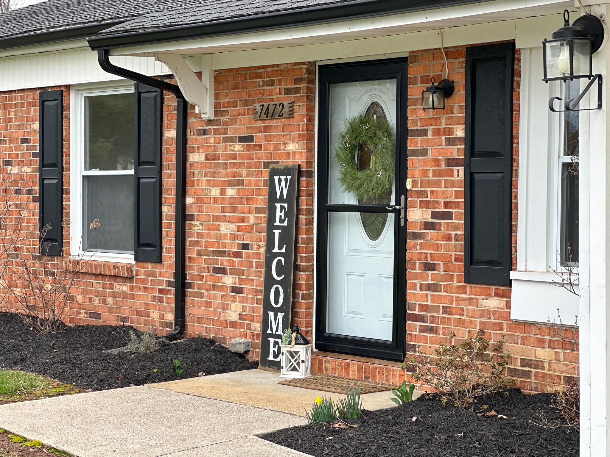 7472 Lilly Square Dayton, VA 22821 - Photo 4 of 30 a front view of a house with a yard