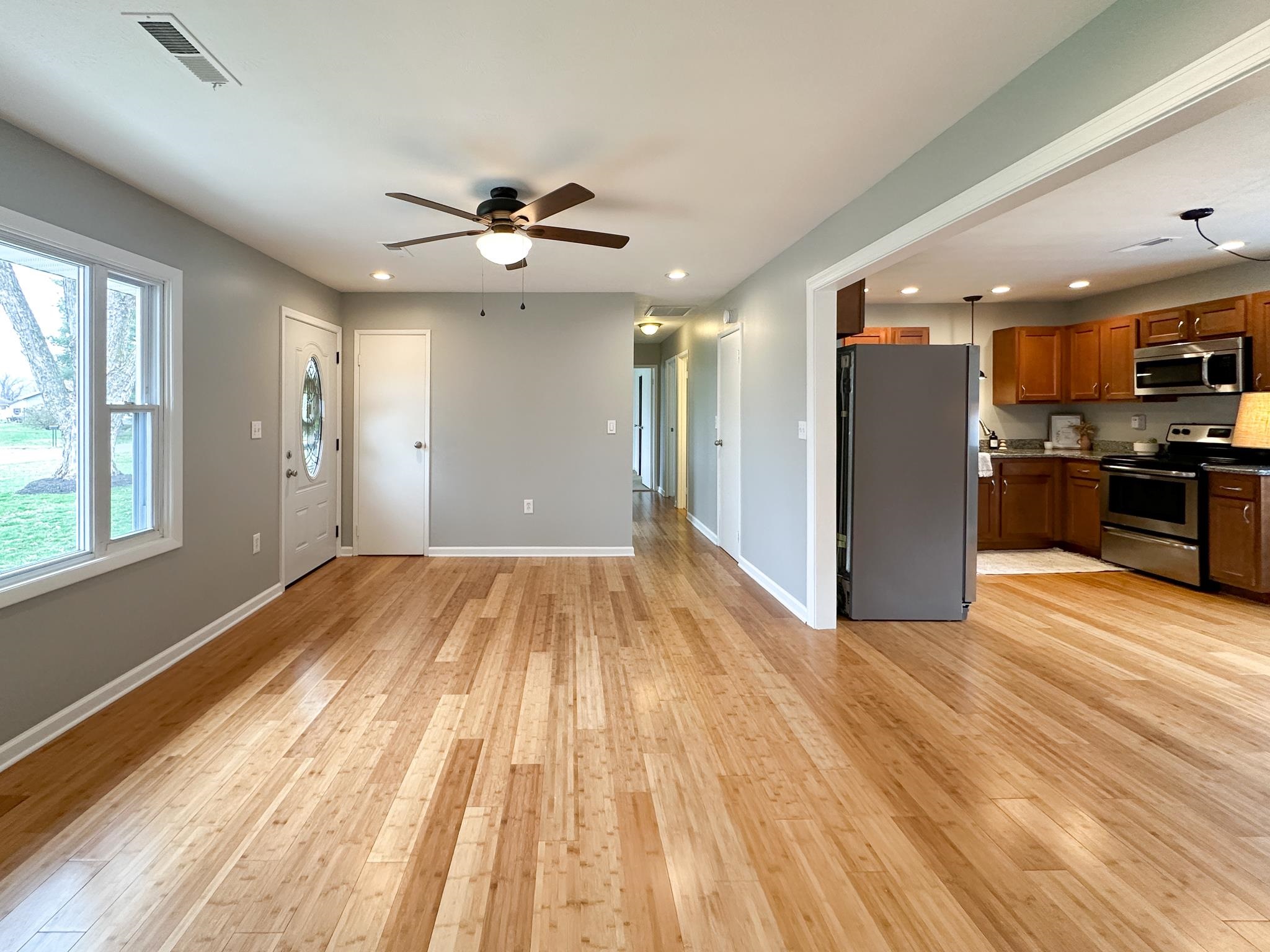 7472 Lilly Square Dayton, VA 22821 - Photo 10 of 30 a view of livingroom with kitchen and wooden floor