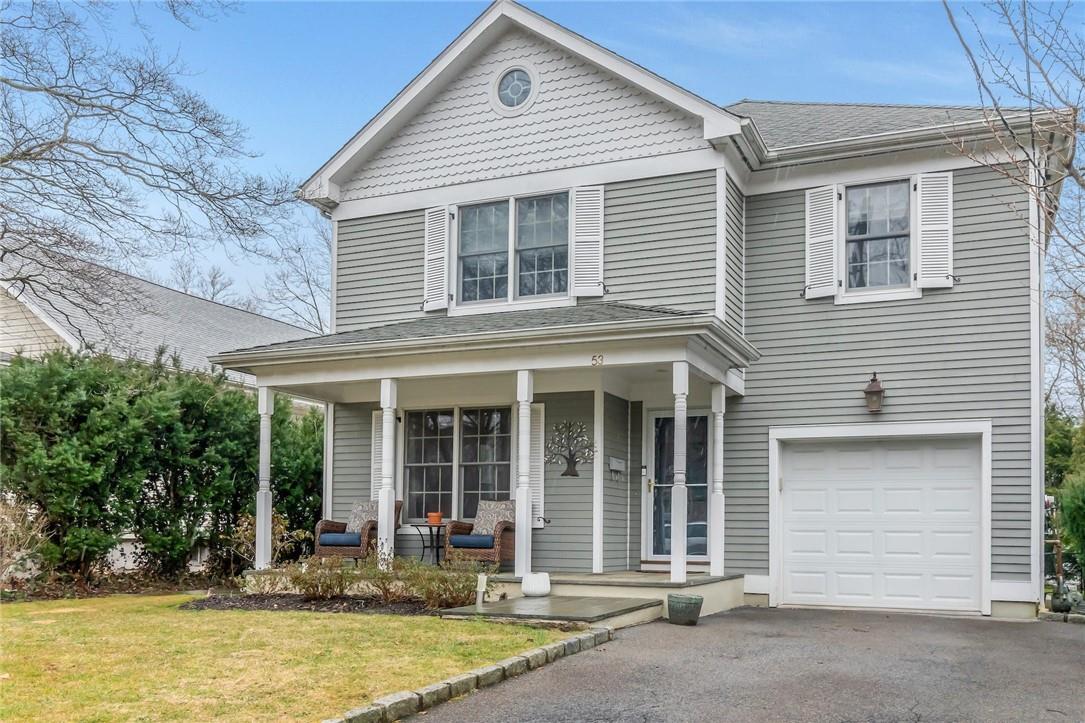 Front with front porch, one car garage