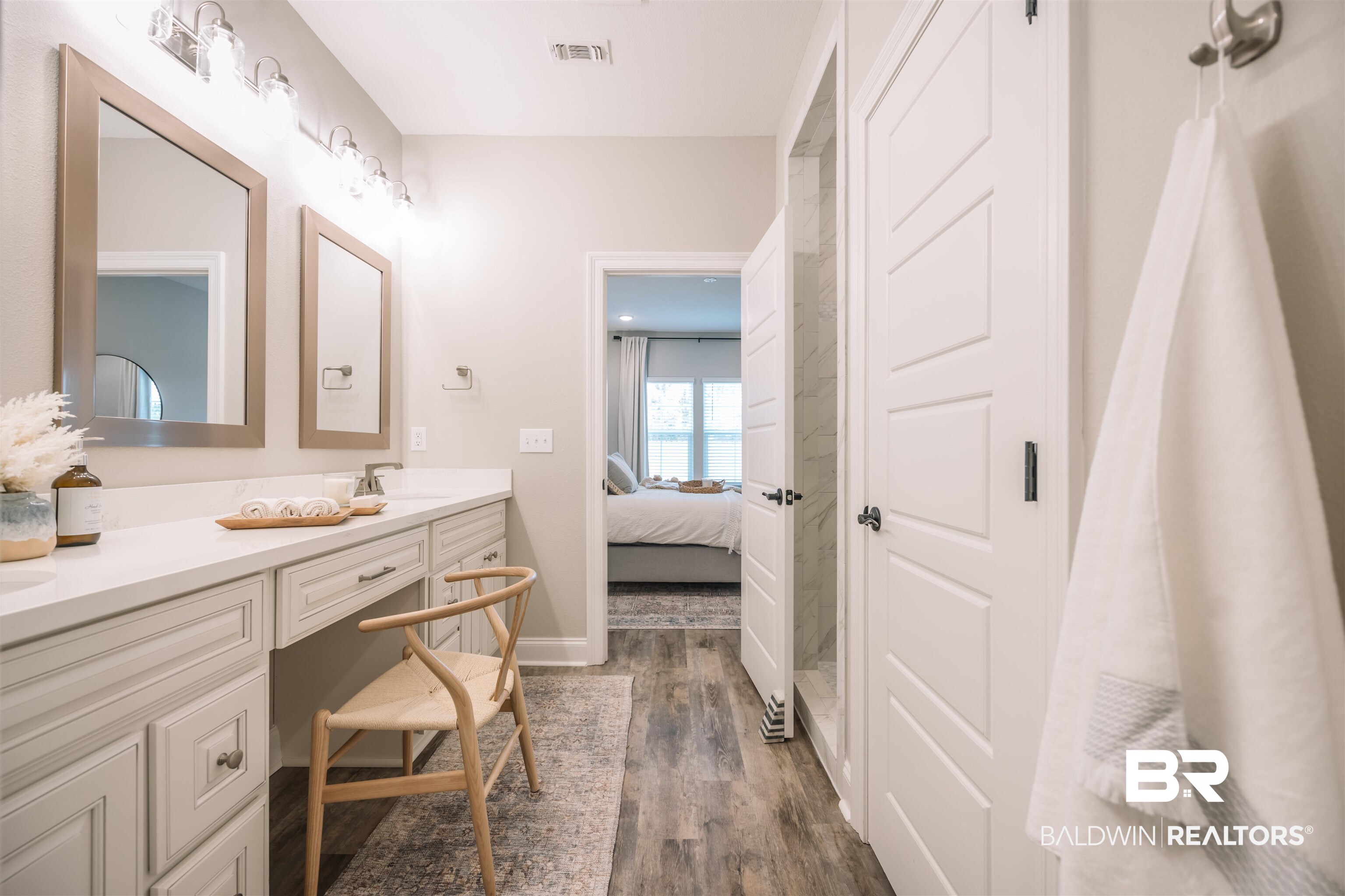 12894 Flanagan Street Elberta, AL 36530 - Photo 25 of 29 Bathroom with vanity and hardwood / wood-style flooring