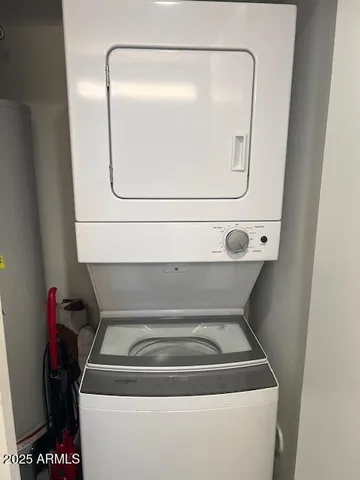 a utility room with washer and dryer
