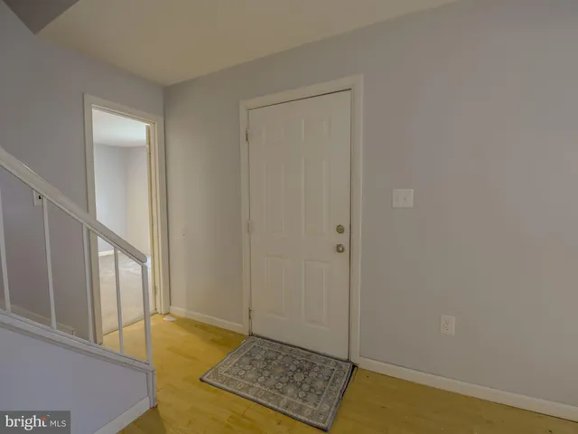 a bathroom with a mirror and a shower