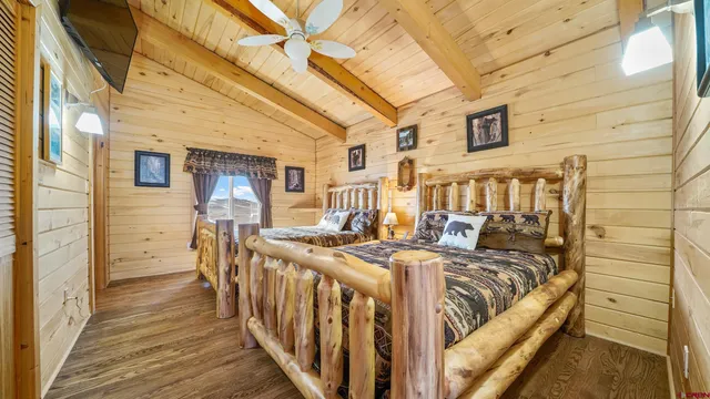 a bathroom with a tub sink and shower