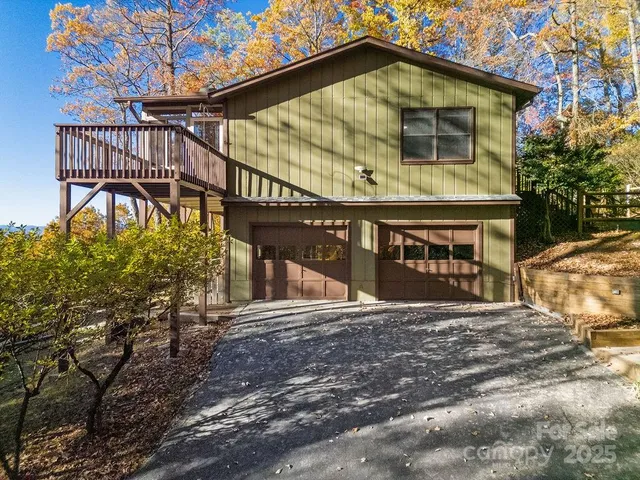 a room with a fireplace and a wooden floor