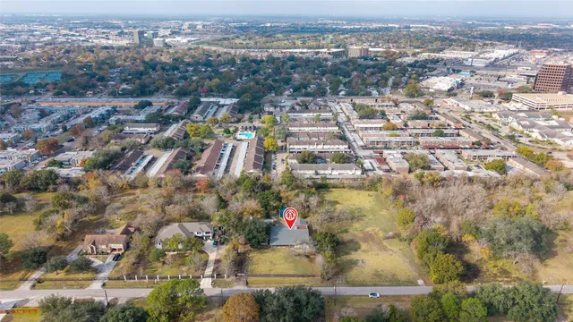 an aerial view of residential building and lake view
