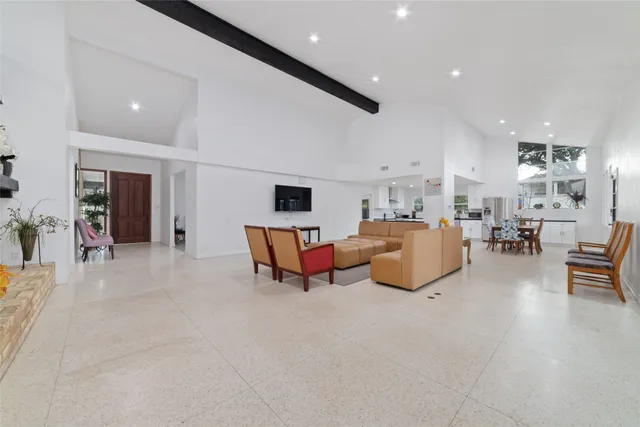 a living room with furniture and a table