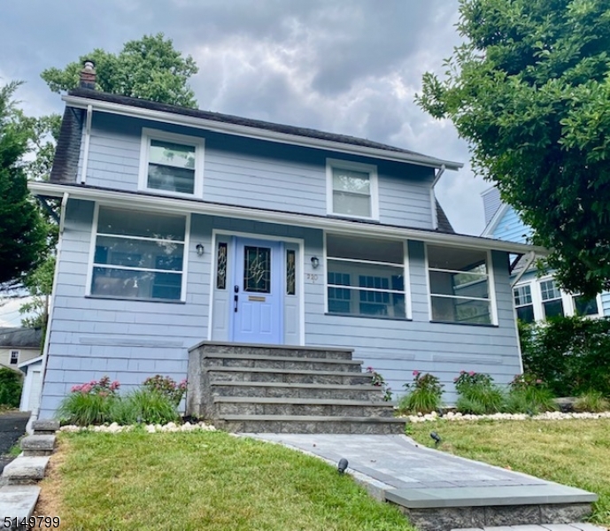 220 South Ridgewood Road South Orange, NJ 07079 - Photo 1 of 1 a front view of a house with a garden