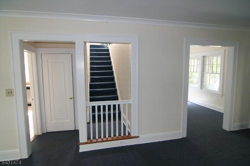 220 South Ridgewood Road South Orange, NJ 07079 - Photo 5 of 14 wooden floor in a hall with a window