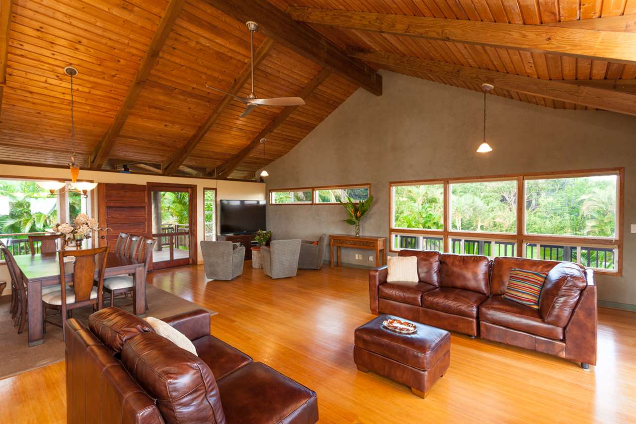 480 Hoolawa Road Haiku, HI 96708 - Photo 12 of 30 a living room with furniture and a large window