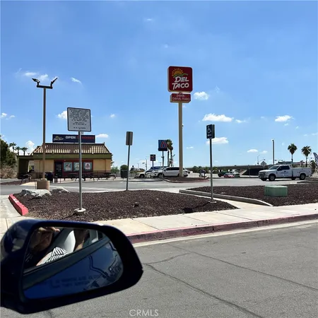 a view of a building with a garden