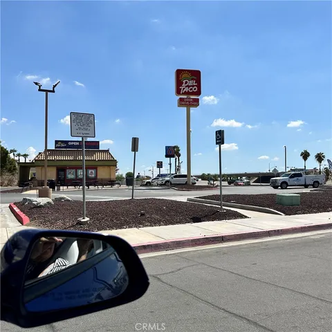 a view of a building with a garden