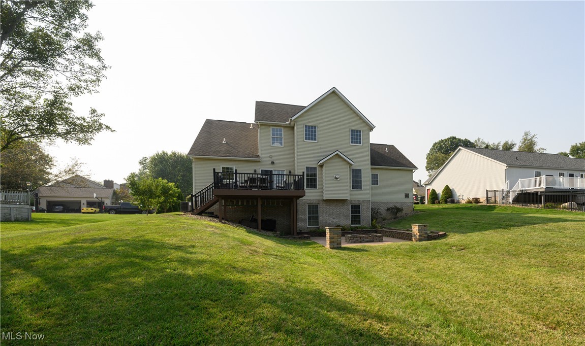 6986 Sweetwater Road Northeast Canton, OH 44721 - Photo 32 of 36 Back of property featuring the walk out door