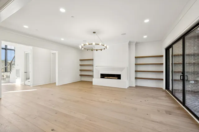 a kitchen with stainless steel appliances a sink and a stove