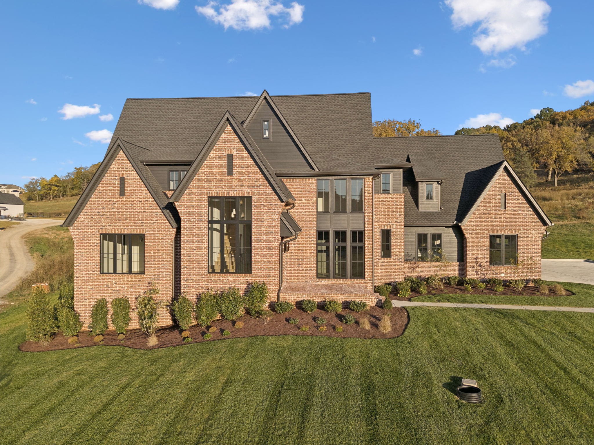 9204 Horton Highway College Grove, TN 37046 - Photo 2 of 87 a front view of a house with a yard