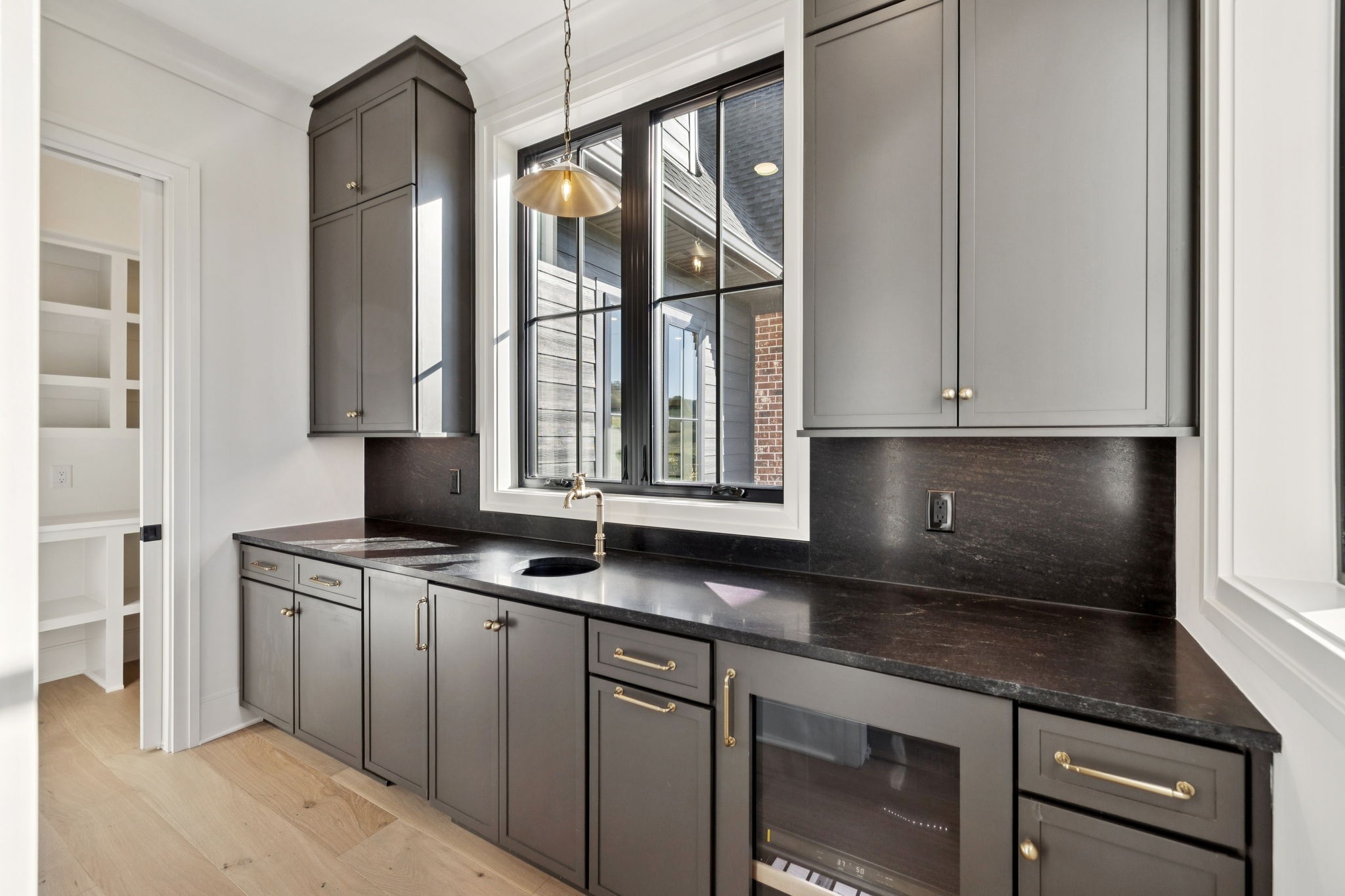 9204 Horton Highway College Grove, TN 37046 - Photo 24 of 87 a kitchen with stainless steel appliances granite countertop a stove a sink and a microwave