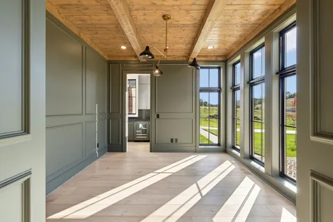 a view of a room with a large window
