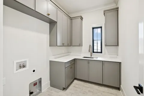 a bathroom with a sink a toilet and a bathtub