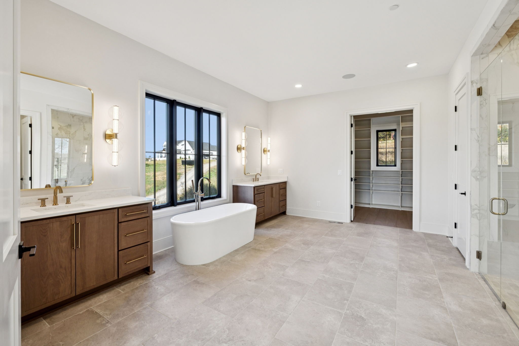 9204 Horton Highway College Grove, TN 37046 - Photo 34 of 87 a large white room with mirror and a sink