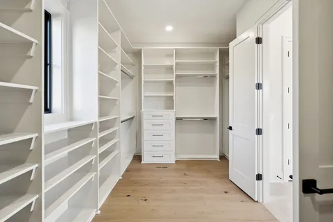 a kitchen with a stove and a microwave