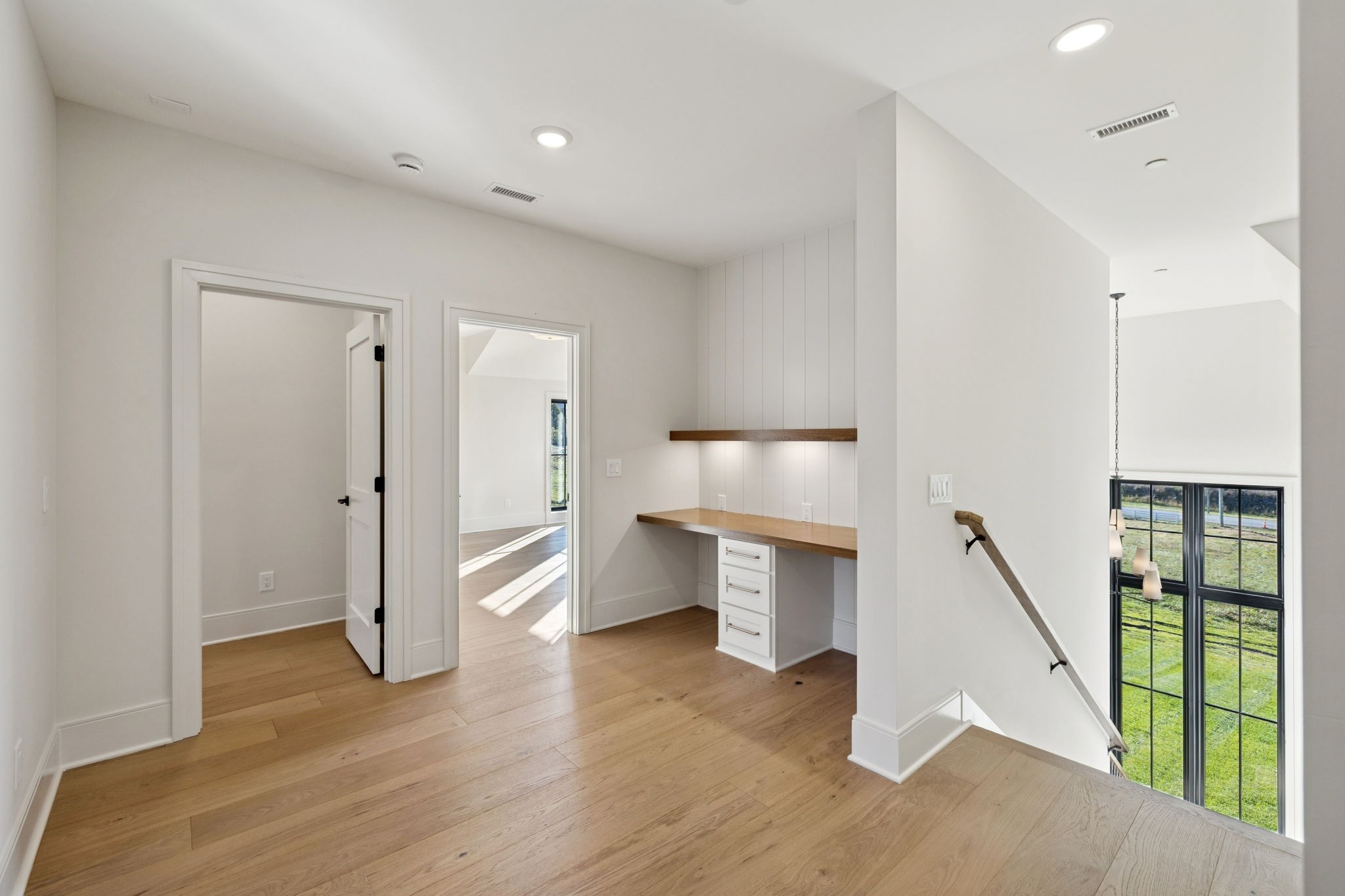 9204 Horton Highway College Grove, TN 37046 - Photo 42 of 87 a view of a hallway with wooden floor and entryway