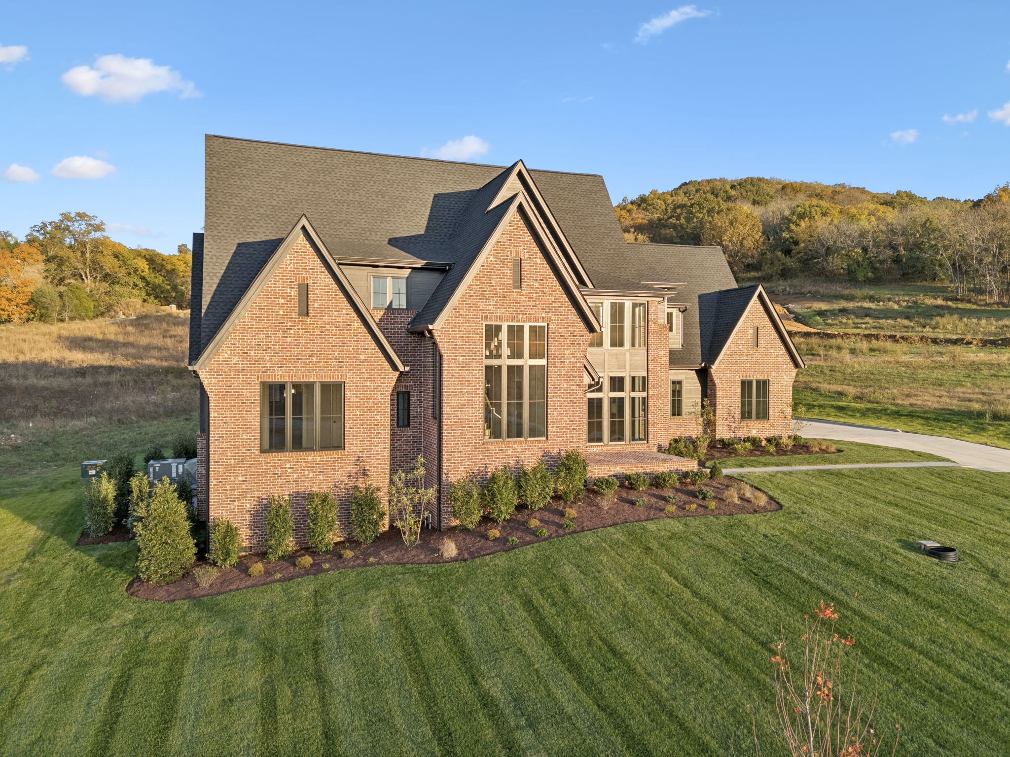 9204 Horton Highway College Grove, TN 37046 - Photo 5 of 87 a front view of house with yard and green space