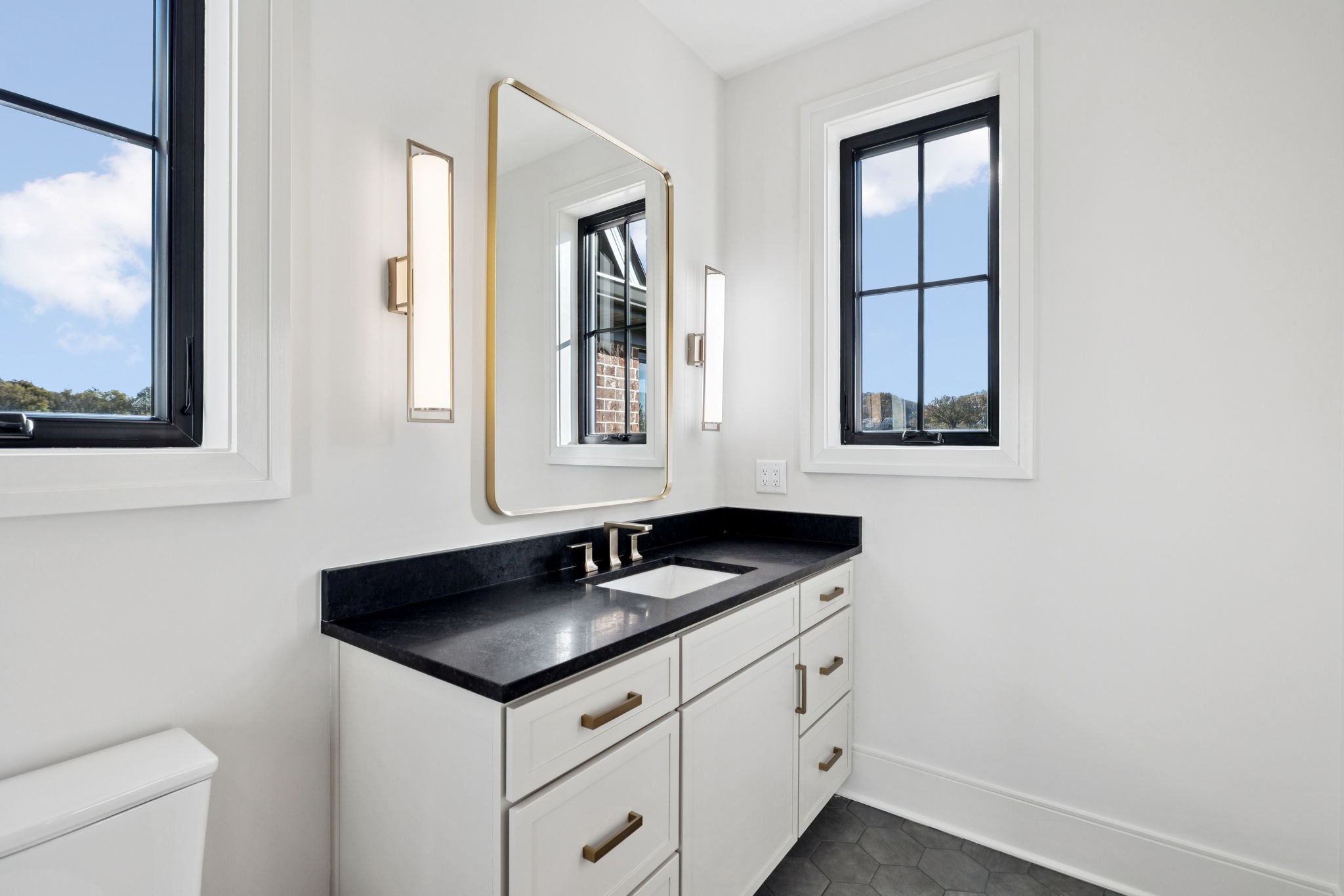 9204 Horton Highway College Grove, TN 37046 - Photo 51 of 87 a bathroom with a sink and a toilet