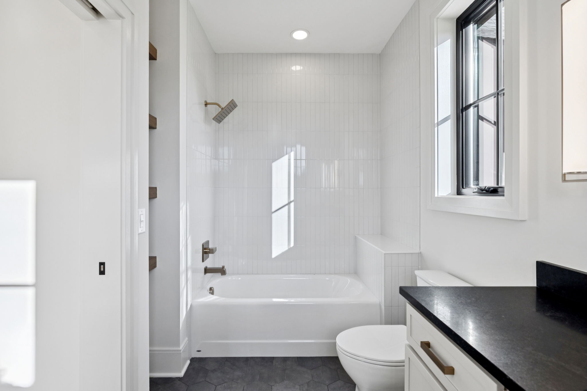9204 Horton Highway College Grove, TN 37046 - Photo 52 of 87 a bathroom with a sink a toilet and a bathtub