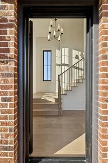a kitchen with a stove oven and sink