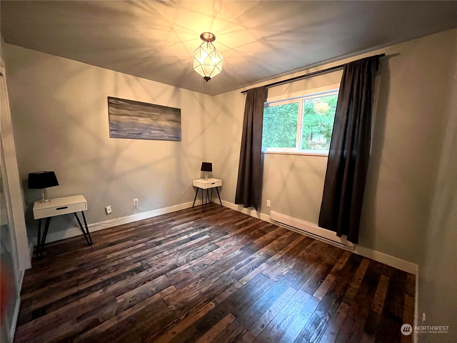 68 Regina Way Point Roberts, WA 98281 - Photo 13 of 24 a view of empty room with wooden floor and fan