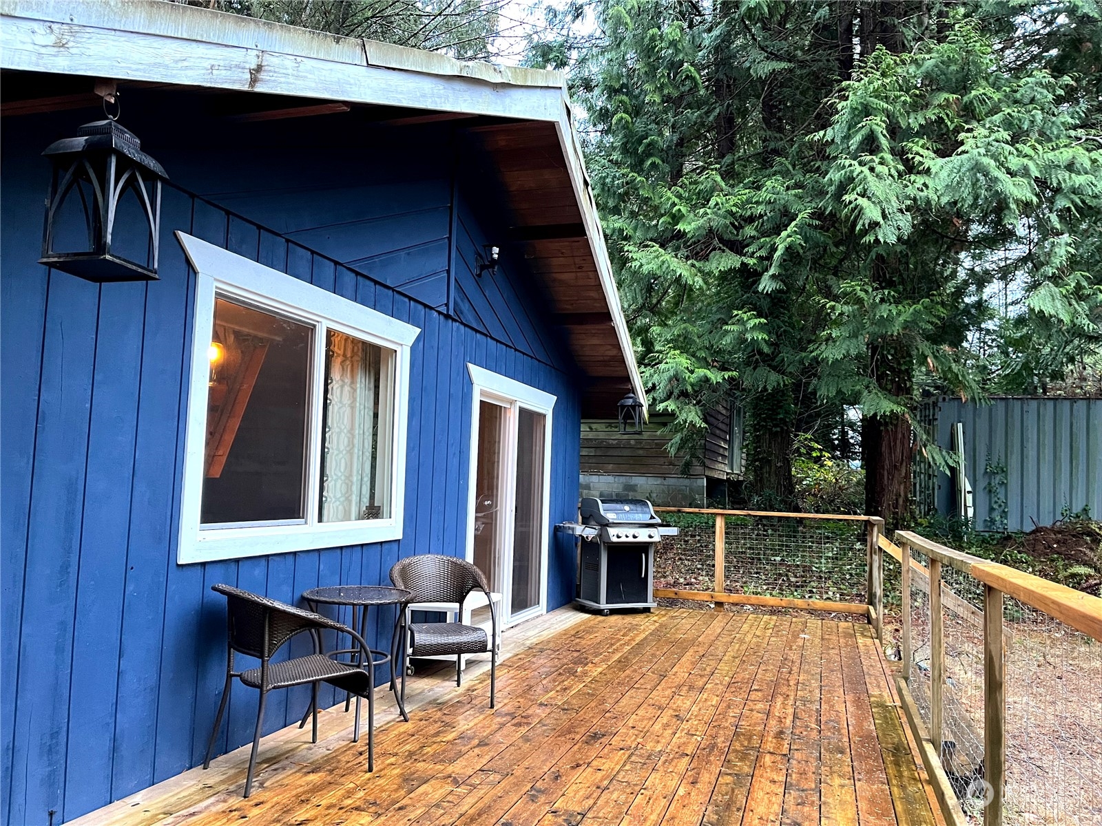 68 Regina Way Point Roberts, WA 98281 - Photo 3 of 24 a balcony with table and chairs