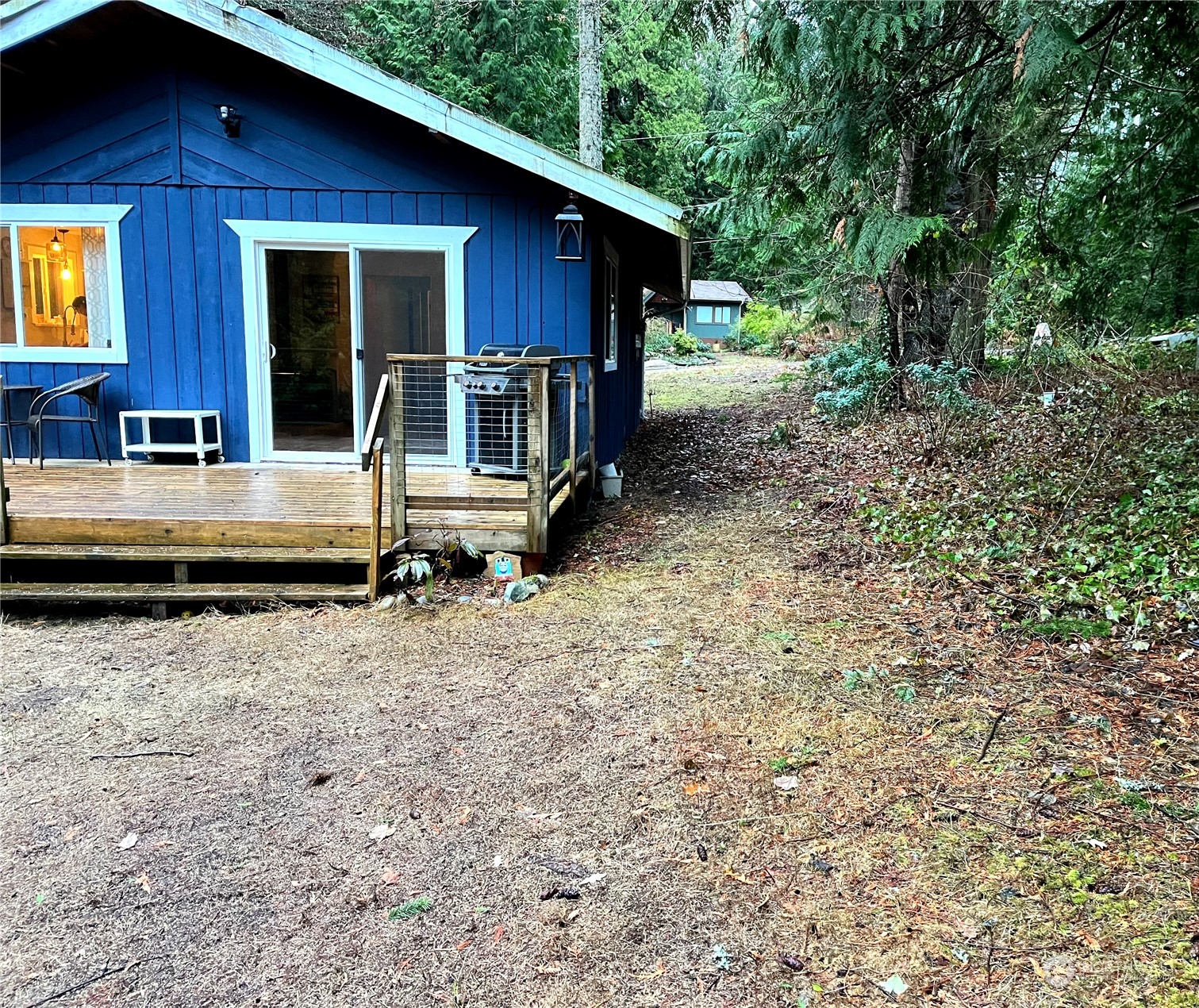 68 Regina Way Point Roberts, WA 98281 - Photo 4 of 24 a front view of house with yard