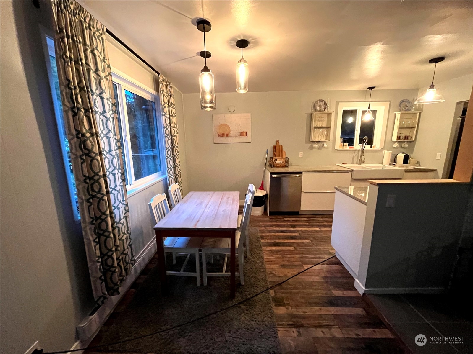 68 Regina Way Point Roberts, WA 98281 - Photo 6 of 24 a dining room with wooden floor and breakfast area