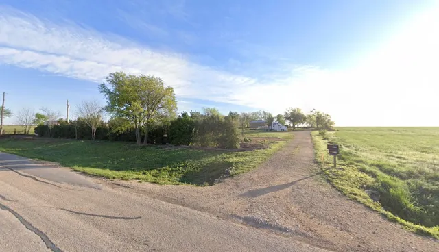 a view of a lake with a big yard