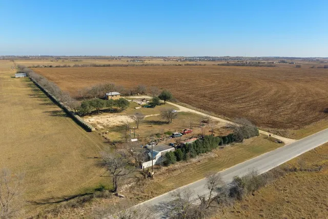 an aerial view of beach and ocean