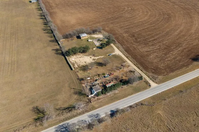 a view of a town with mountains in the background