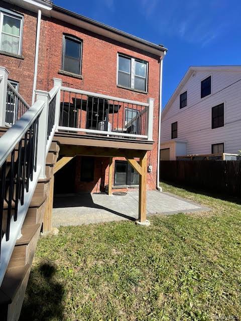 12 South Street, Unit 2 Beacon, NY 12508 - Photo 13 of 28 Between the deck, the patio and the backyard, this home offers plenty of opportunity to spend time outside.
