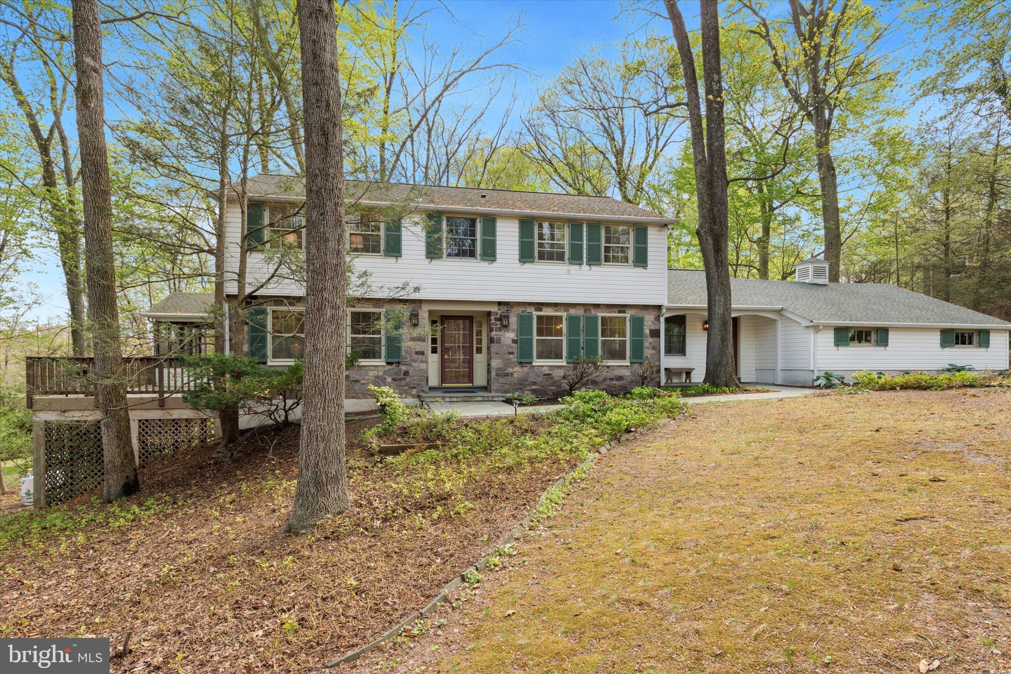 99 Elfman Drive Doylestown, PA 18901 - Photo 1 of 35 a front view of a house with a yard and porch