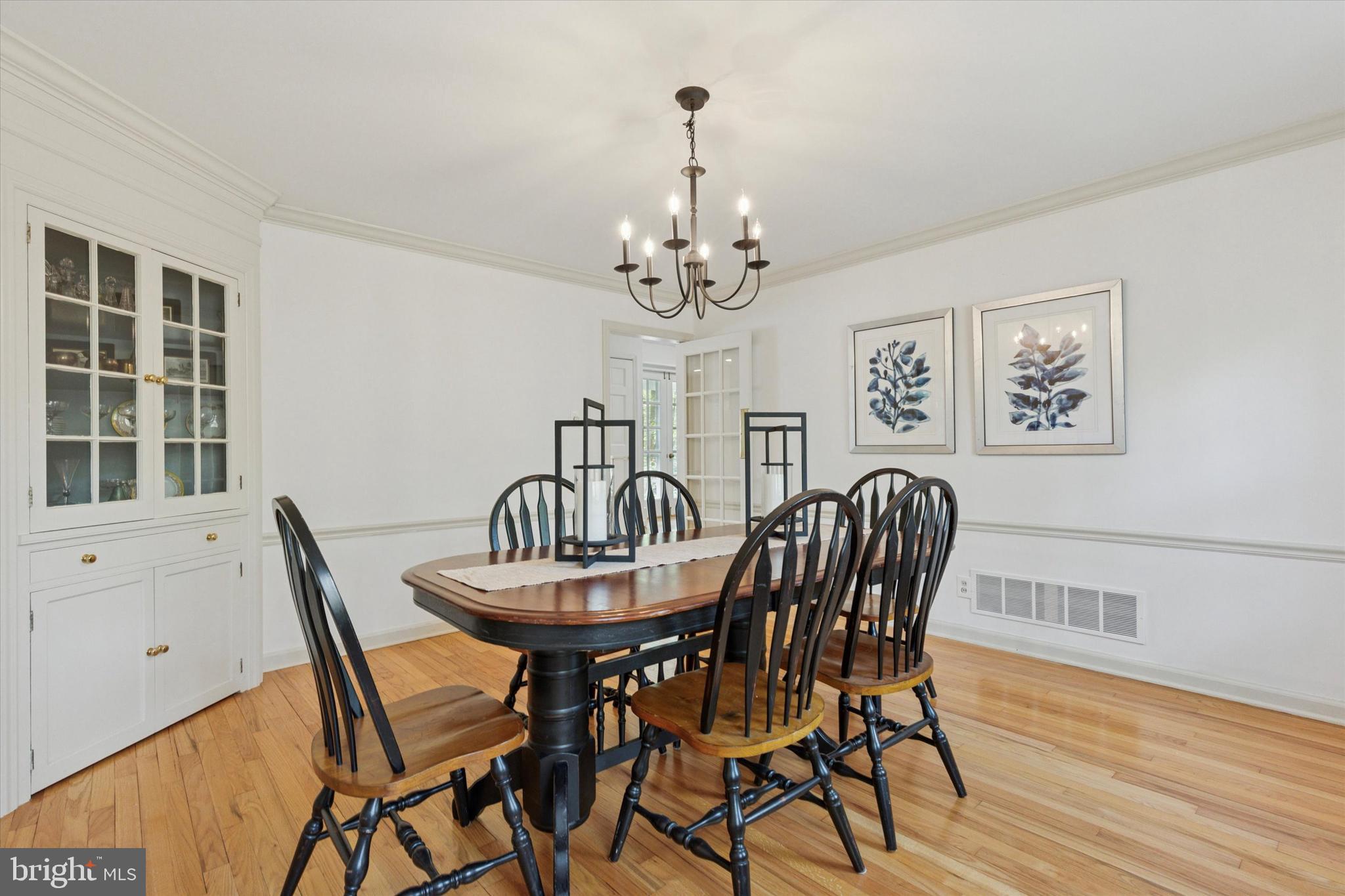 99 Elfman Drive Doylestown, PA 18901 - Photo 11 of 35 a view of a dining room with furniture window and wooden floor